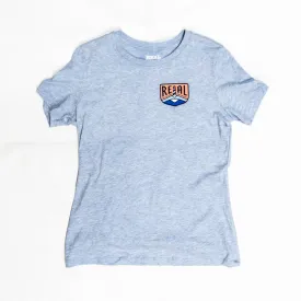 REAL Wmn's Lighthouse Badge Tee-Heather Prism Blue